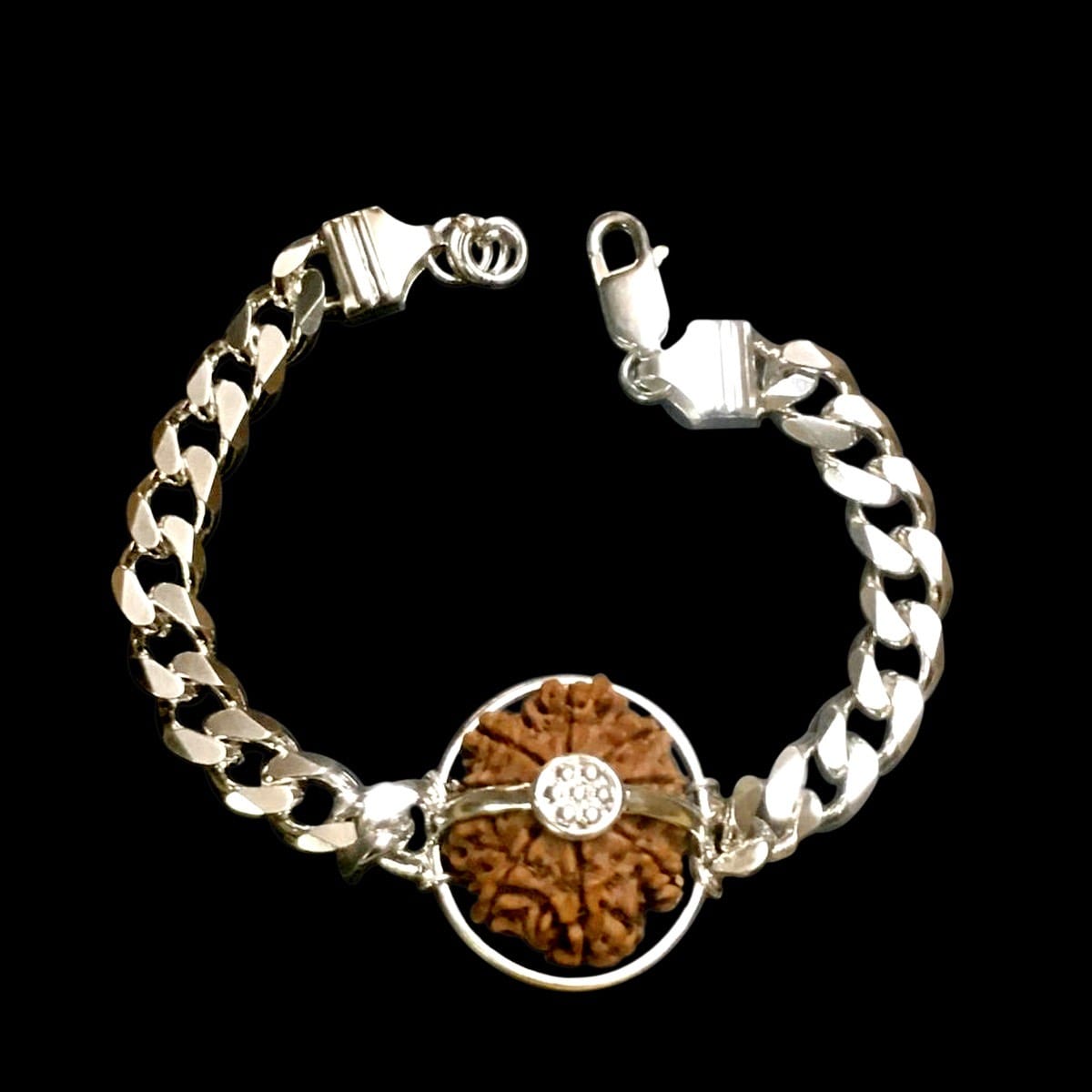 a36aac63-d59a-445f-b8db-a7bf67deb181.jpeg 8 Mukhi Nepal Rudraksha In Pure Silver Bracelet - Image 1